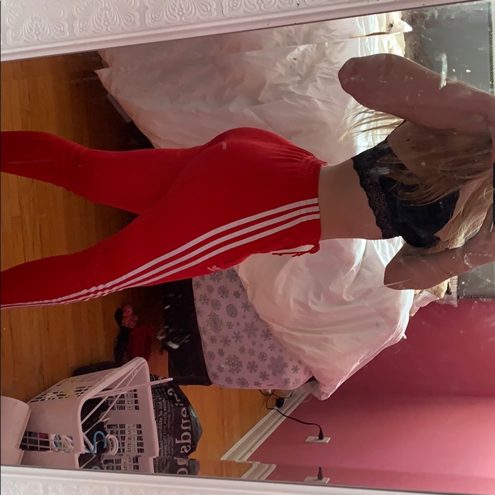 red adidas track pants